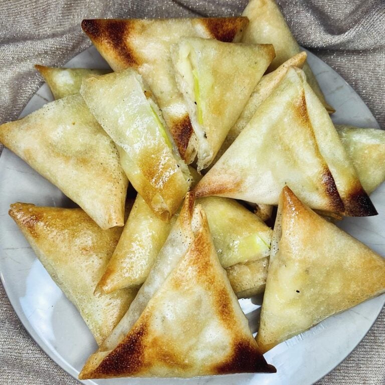 Homemade Crispy Cheesy Zucchini Samosas, freshly made and ready to serve