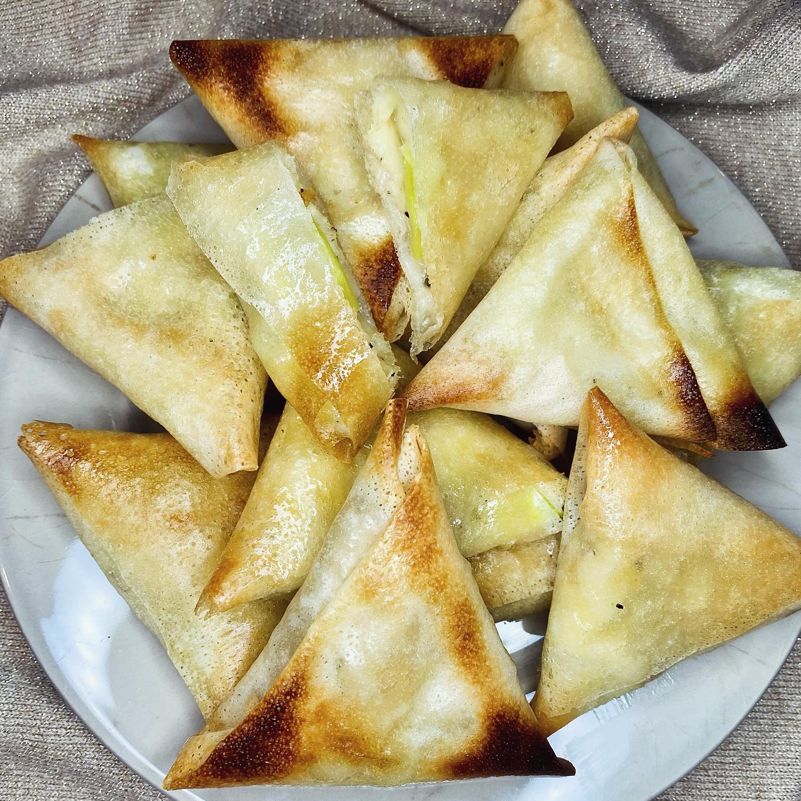 Homemade Crispy Cheesy Zucchini Samosas, freshly made and ready to serve